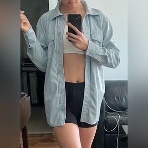 Baby blue vegan leather shirt, size small and fit oversize
